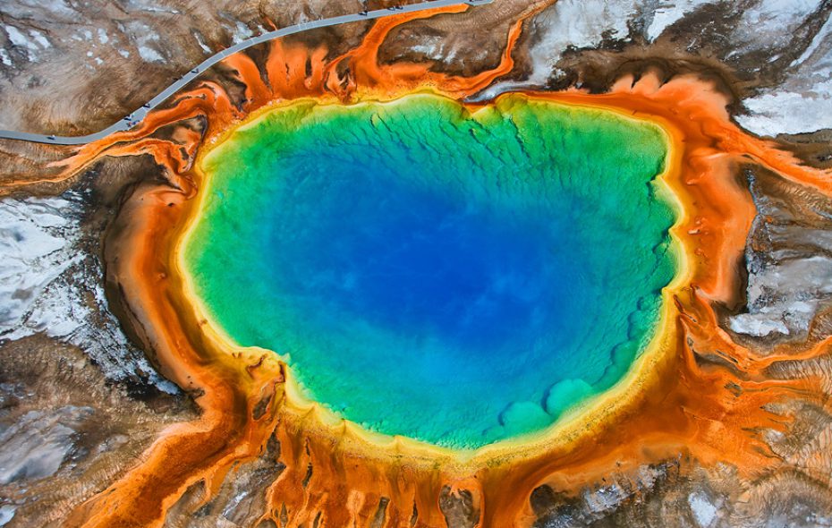 An image of the Grand Prismatic Spring (licensed from photographer Werner van Steen), representing the origin of our sulfur-utilizing mitochondrial ancestors